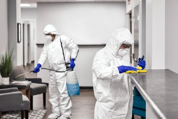 two-decontamination-specialists-decontaminating-a-room (1)